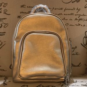 INC Farahh backpack bag. metallic gold-silver. NWT